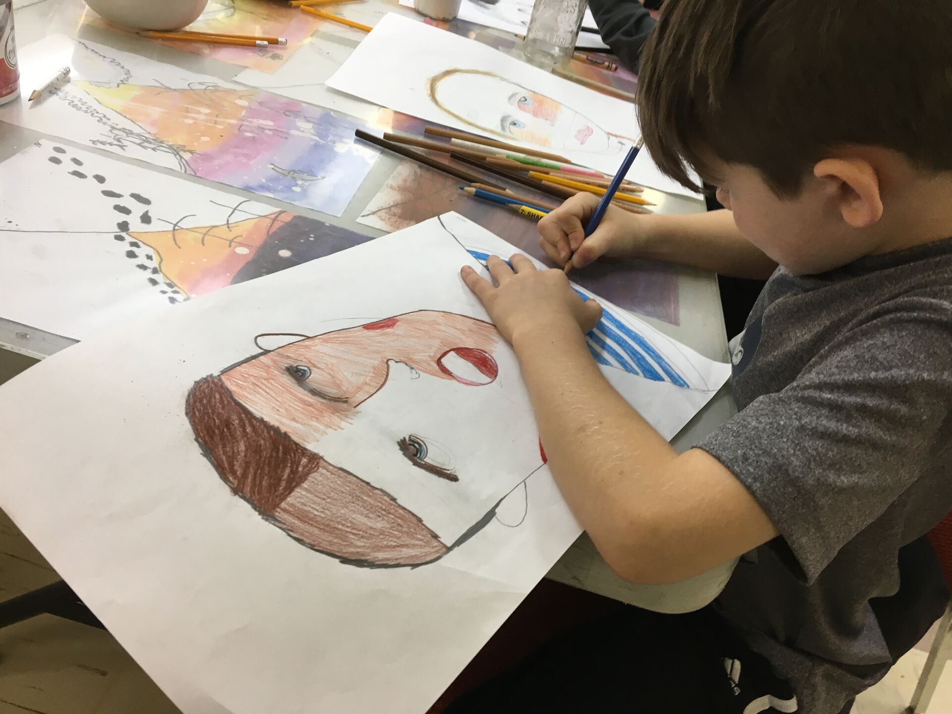 Picture of a child drawing.