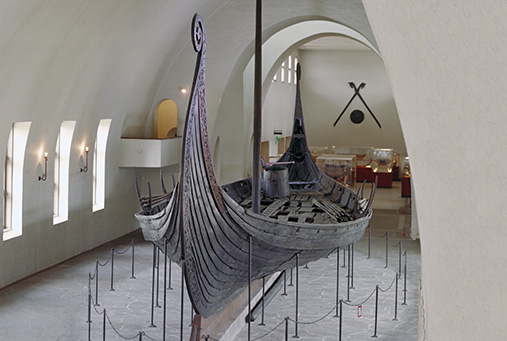 The Oseberg ship in the Viking Ship Museum. © Museum of Cultural History, University of Oslo/ Eirik Irgens Johnsen